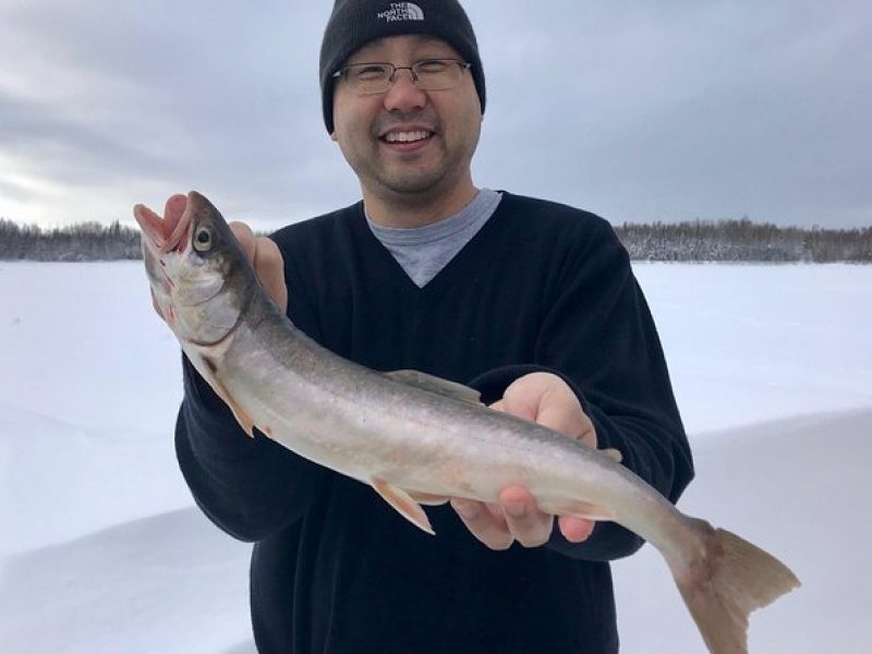 Fairbanks Ice Fishing Expedition in a Heated Cabin with Fish Cookout