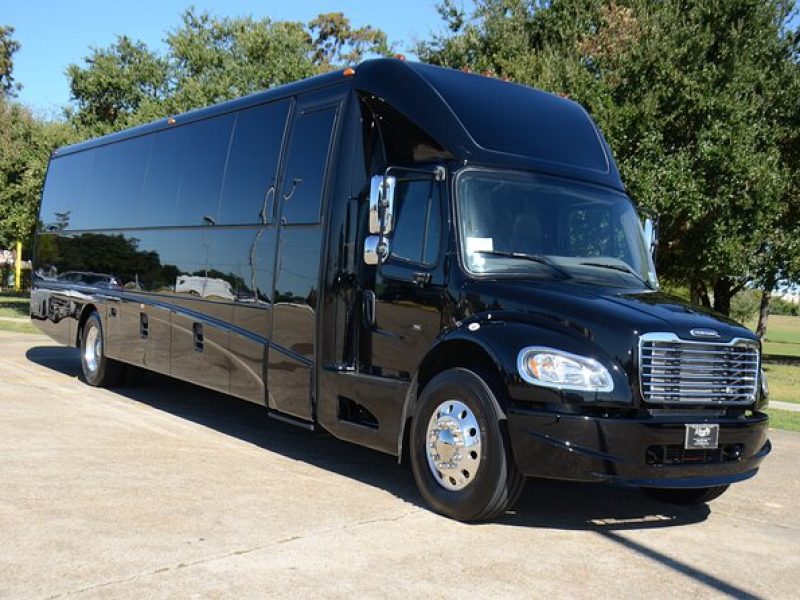 Transfer in 39 Passenger Bus from MSY/Port to Downtown