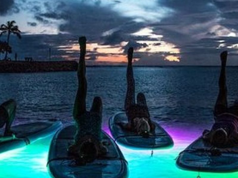 Night SUP Yoga in Honolulu, Hawaii