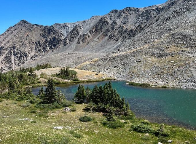 Hike to Nature’s Hidden Gems: Alpine Lake or Waterfall Adventure