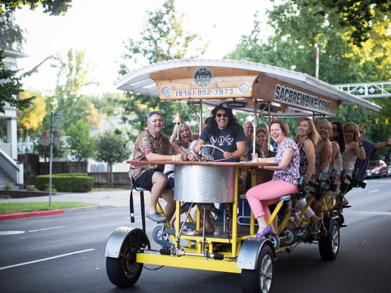 Pedal, Drink, and Bar hop through Sacramento on a 15 seat Beer Bike