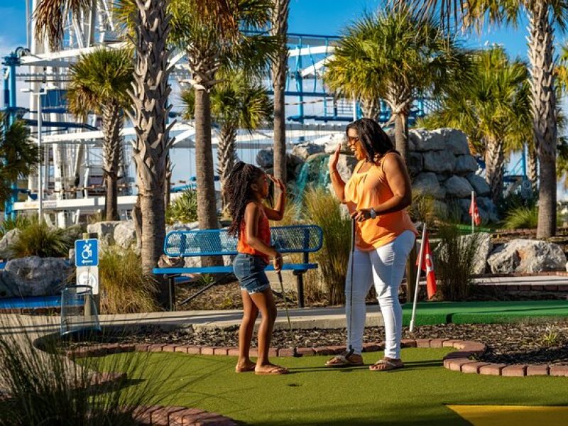 Mini Golf beneath SkyWheel Panama City Beach